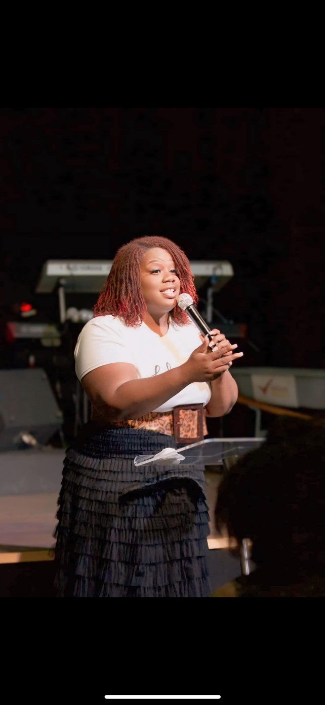 Shantoria Gallagher-Potts speaking at a conference